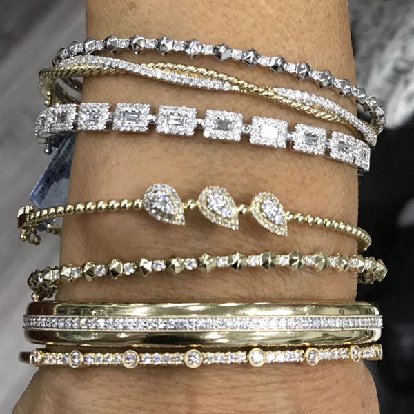 Collection of 14K White Gold and Diamond Bangles