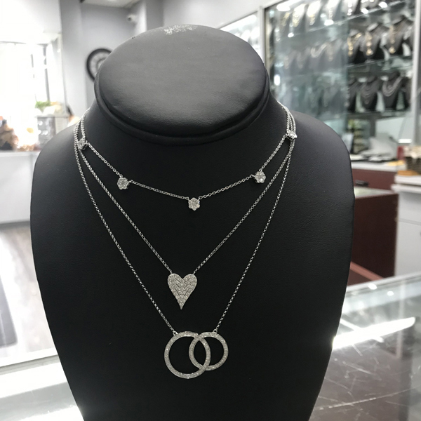 Collection of 14K White Gold and Diamond Pendants and Necklaces