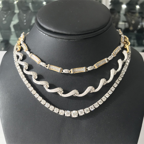 A Collection of 14K white/yellow gold and diamond fine necklaces